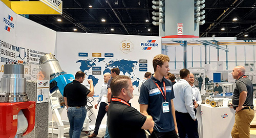 FISCHER USA team members showcasing their latest spindle technology at IMTS 2024.