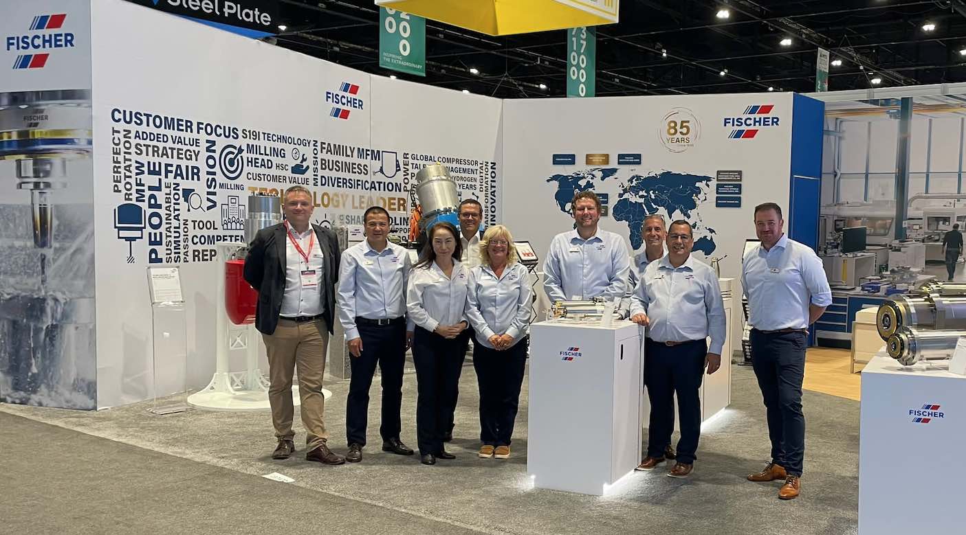 FISCHER USA team members showcasing their latest spindle technology at IMTS 2024.